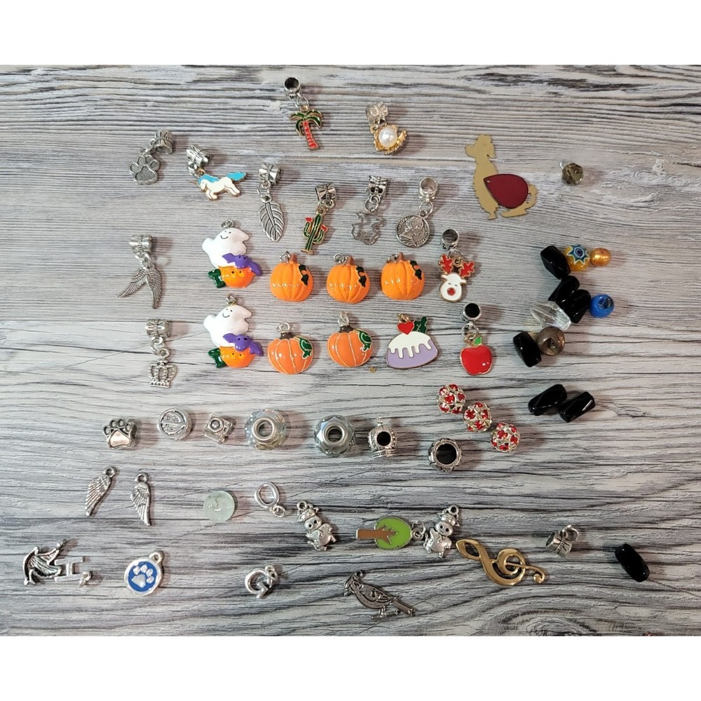 Bracelet charms lot pumkins dog paws unicorn beads and more